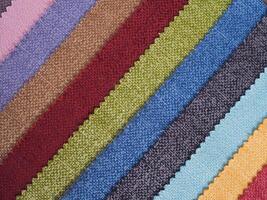 Colorful background, A stack of colorful fabric. Full frame shot of muti colored fabric background photo