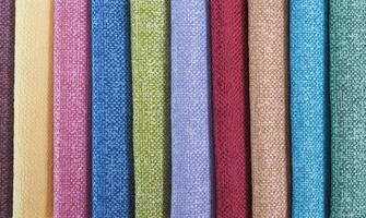 Colorful background, A stack of colorful fabric. Full frame shot of muti colored fabric background photo