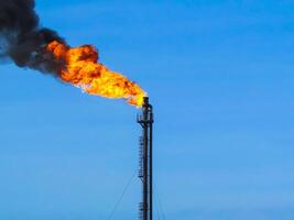 Torch system on an oil field photo