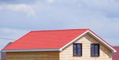 The roof of corrugated sheet on the houses photo