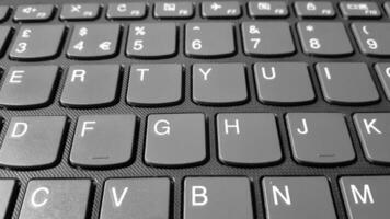 image of a black laptop keyboard photo