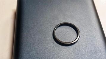 picture of an engagement ring in black photo