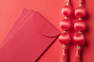 Top view of Chinese New Year red packet with customizable space for text or wishes photo