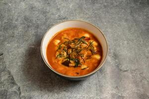 Seafood kerang panang talay served in dish isolated on background top view of bangladeshi food photo