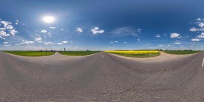 spherical 360 hdri panorama on old asphalt road among corn fields with clear blue sky and sun in equirectangular seamless projection, as skydome replacement in drone panoramas, game development photo