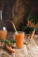 freshly squeezed carrot juice,and raw carrots,vegetarian vegetable vitamin drink photo