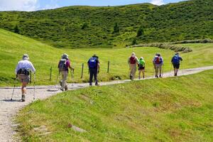 Hikers walking towards the Langkofel photo