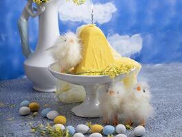 Traditional Easter Orthodox curd cake with yellow flowers against a blue sky photo