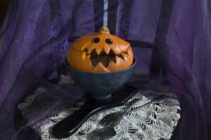 Halloween Pumpkin head, pumpkin with teeth and eyes, selective focus, photo