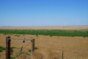 Windmills on the range in eastern Oregon photo