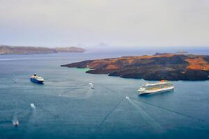 Cruise ships and tourist boats in sea photo