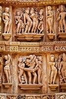 Famous erotic stone sculptures of Khajuraho photo