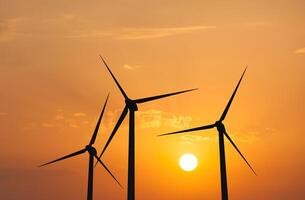 Wind generator turbines in sky photo