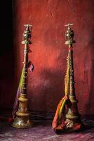 Buddhist prayer horns in Tibetan monastery photo