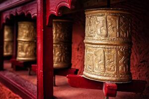 Buddhist prayer wheels , Ladakh photo