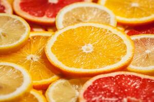 Colorful citrus fruit slices photo