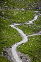 Serpentine road in Himalayas mountains photo