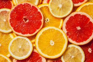 Colorful citrus fruit slices photo