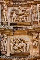 Famous erotic stone sculptures of Khajuraho photo