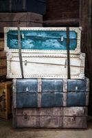 Vintage luggage with crates and suitcases photo