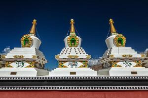 White chortens stupas in Ladakh, India photo