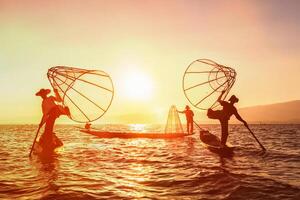 Traditional Burmese fisherman at Inle lake, Myanmar photo