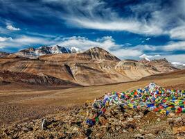 Buddhist prayer flags in Himalayas photo