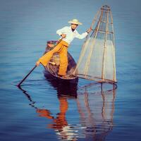 Traditional Burmese fisherman at Inle lake Myanmar photo