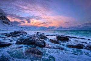 Norwegian Sea waves on rocky coast of Lofoten islands, Norway photo