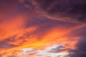 Sunset sky with dramatic clouds photo