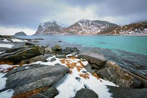 Rocky coast of fjord in Norway photo
