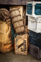 Vintage luggage with crates and suitcases photo