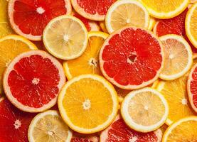 Colorful citrus fruit slices photo