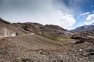 Manali-Leh Road in Indian Himalayas with lorry photo