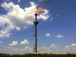 Flare for flaring associated gas. The end point of the pressure photo
