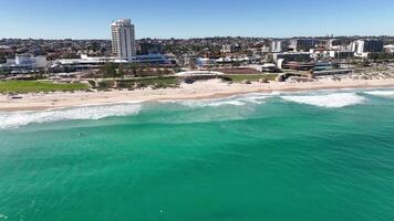 pool by the beach amphitheatre surfing scarborough beach perth aerial 4k video