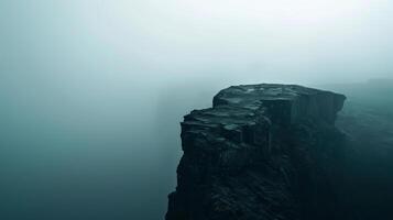 ai generado en pie vacío en parte superior de un montaña vista, blanco espacio acantilado borde con montaña en nubes rock acantilado con niebla foto