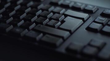 Pressing key with your finger. Closeup of male finger presses button on black computer keyboard. Man nervously presses enter button to send documents for work video