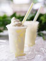Delicious and refreshing milk based beverage, ice milkshake, cold drink, with different topping and mix photo