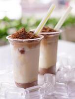 Delicious and refreshing milk based beverage, ice milkshake, cold drink, with different topping and mix photo