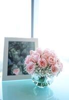 A bouquet of flowers in a beautiful vase good for multimedia background photo