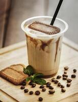 Delicious and refreshing coffee based beverage, ice coffee, cold drink, coffee beans photo