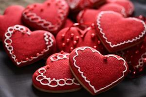 ai generado rojo corazón conformado San Valentín día azúcar galletas foto