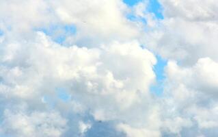 photo of white sky and bright blue clouds