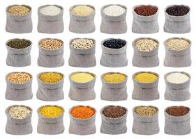 Collection of different cereals, grains and flakes in bags isolated on white background. photo