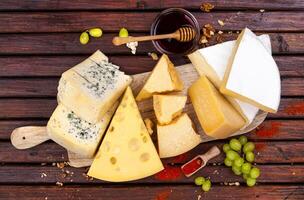 Cheese board. Various types of cheese. Top view photo