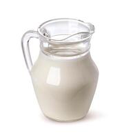 Jug of milk isolated on white background photo