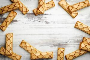 Sfogliatine, glazed puff pastry biscuit. Italian dessert , top view, food background. photo