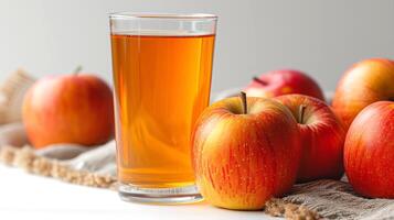 AI generated glass of fresh apple juice with apple fruits isolated on withe background. photo