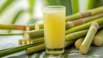 AI generated Fresh squeezed sugar cane juice with sugar cane plantation farming background photo